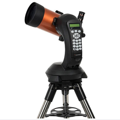 Orange and black telescope with control pad and tripod.